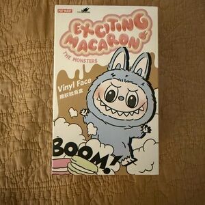 Exciting Macaron Vinyl Face Accessory. Sesame Bean. Unopened from PopNow.